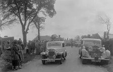 Austin sports saloon of Mrs MS Flewitt and Rolls-Royce saloon at the RSAC Scottish Rally, 1934. Artist: Bill Brunell