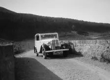 Austin Ten-Four 2-door saloon of JA Flewitt competing in the RSAC Scottish Rally, 1933. Artist: Bill Brunell