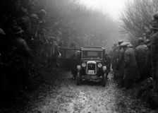 Austin top hat saloon of EC Smyth competing in the MCC Exeter Trial, Meerhay, Dorset, 1930. Artist: Bill Brunell
