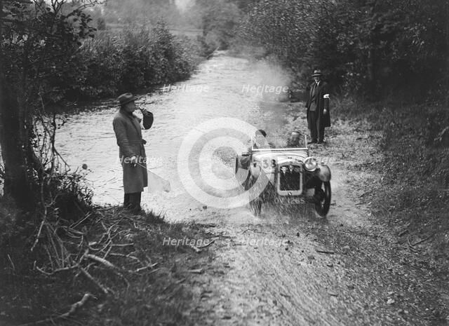 Austin Ulster competing in the JCC Lynton Trial, 1932. Artist: Bill Brunell.