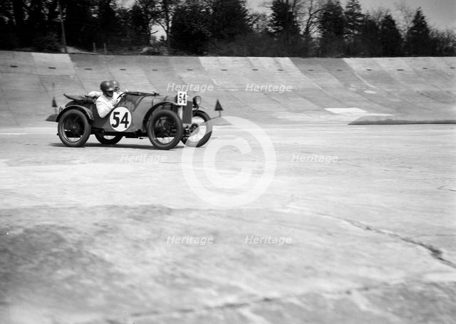 Austin Ulster of Victoria Worsley and R Latham-Boote, JCC Double Twelve race, Brooklands, 1931. Artist: Bill Brunell.
