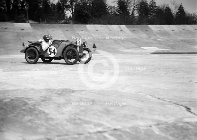 Austin Ulster of Victoria Worsley and R Latham-Boote, JCC Double Twelve race, Brooklands, 1931. Artist: Bill Brunell.