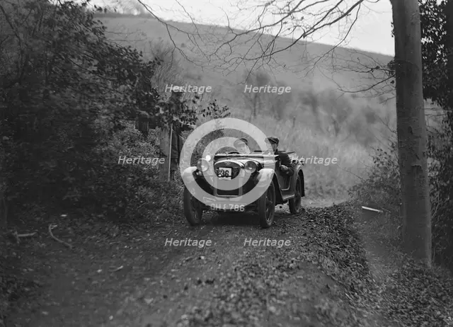 Austin Ulster of WGE Rushworth competing in the Inter-Varsity Trial, November 1931. Artist: Bill Brunell.