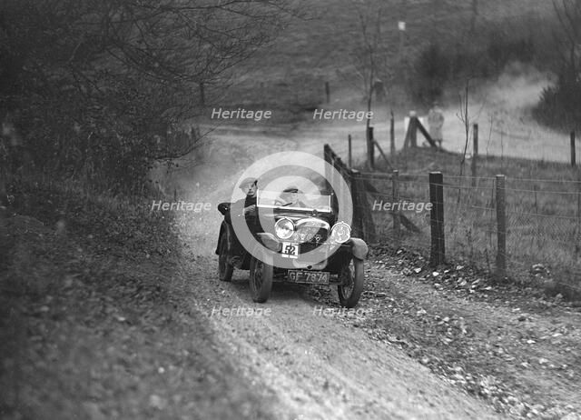 Austin Ulster of AC Fairclough competing in the Inter-Varsity Trial, November 1931. Artist: Bill Brunell.