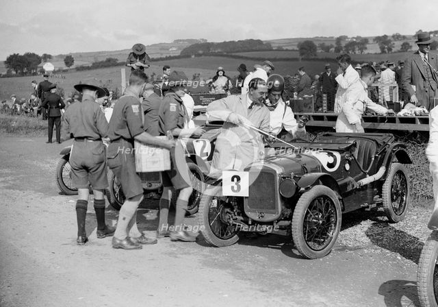 Austin Ulsters of SV Holbrook and GE Caldicutt at the RAC TT Race, Ards Circuit, Belfast, 1929 Artist: Bill Brunell.