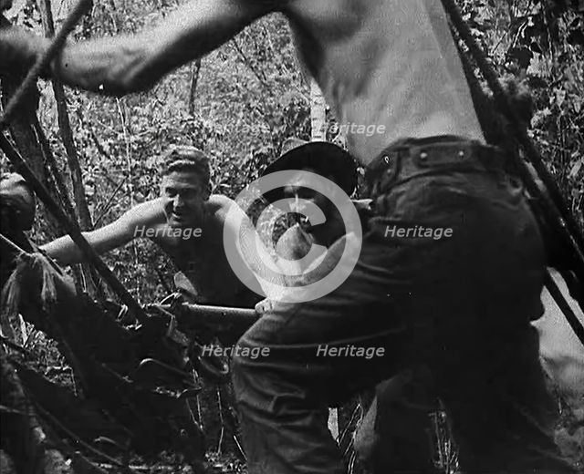 Australian Troops Organising Ropes to Transport Supplies, 1943. Creator: British Pathe Ltd.