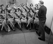 Australian sales girls with SPL sashes listen to a sales talk, Selby, North Yorkshire, 1965. Creator: Michael Walters
