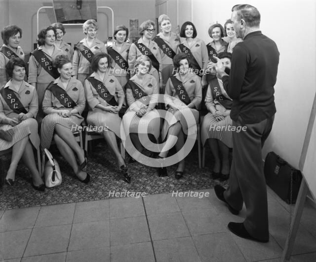 Australian sales girls with SPL sashes listen to a sales talk, Selby, North Yorkshire, 1965. Artist: Michael Walters