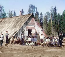 Austrian prisoners of war near a barrack, [near Kiappeselga], 1915. Creator: Sergey Mikhaylovich Prokudin-Gorsky
