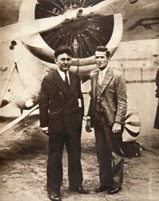 Aviators Wiley Post and Harold Gatty in front of Winnie Mae New York, USA, 1931. Creator: S and G
