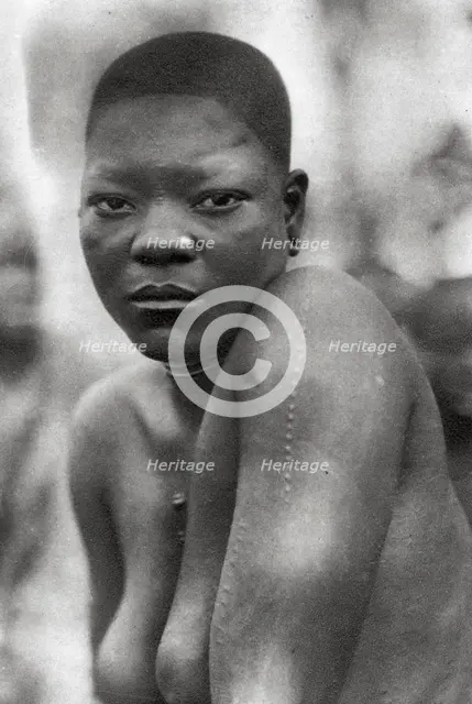 Awemba girl, Livingstone to Broken Hill, Northern Rhodesia, 1925 (1927). Artist: Thomas A Glover