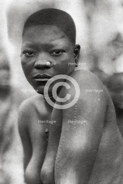 Awemba girl, Livingstone to Broken Hill, Northern Rhodesia, 1925 (1927). Artist: Thomas A Glover