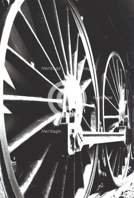 Axle wheels of a steam train engine.