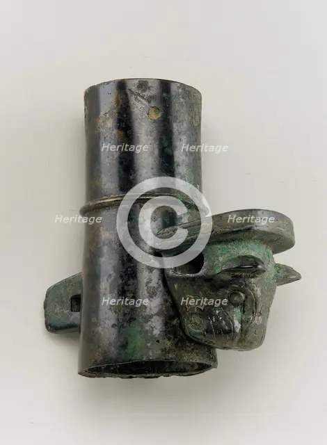 Axle cap with linchpin cast in the form of a feline head, Zhou dynasty, 1050-221 BCE. Creator: Unknown.