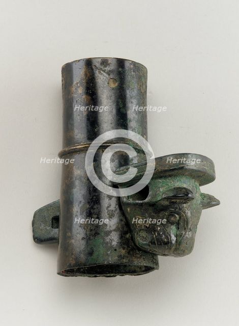 Axle cap with linchpin cast in the form of a feline head, Zhou dynasty, 1050-221 BCE. Creator: Unknown.
