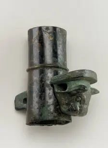 Axle cap with linchpin cast in the form of a feline head, Zhou dynasty, 1050-221 BCE. Creator: Unknown