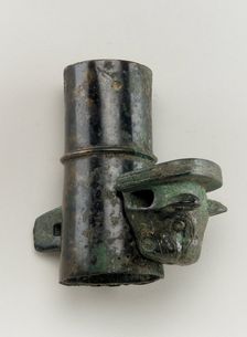 Axle cap with linchpin cast in the form of a feline head, Zhou dynasty, 1050-221 BCE. Creator: Unknown