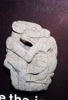 Aztec stone carving of Jaguar killing a Vulture, Hacha, Veracruz state: Mexico, 400-700