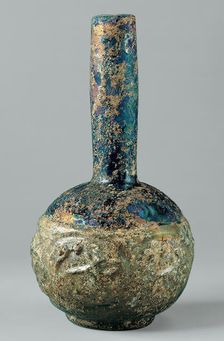 Bottle with Molded Designs of Animals, Iraq or Syria, 9th-10th century. Creator: Unknown