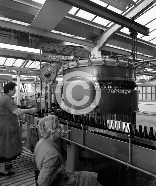 Bottling beer at Ward & Sons bottling plant, Swinton, South Yorkshire, 1961. Creator: Michael Walters.