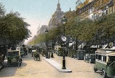 Boulevard des Italiens, Paris, with cars and motor buses on the street, c1900