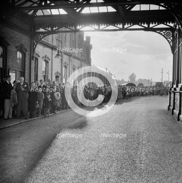 Bournemouth train station during an outing of Laing's London office to Bournemouth, Hampshire, 1953. Creator: John Laing plc.