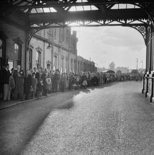 Bournemouth train station during an outing of Laing's London office to Bournemouth, Hampshire, 1953. Creator: John Laing plc