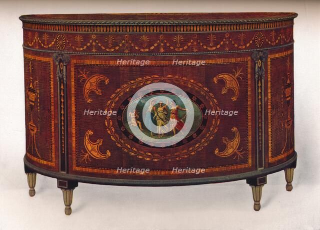 'Bow-Fronted Commode, with Metal Mouldings and Headings, veneered and inlaid with coloured woods', c Artist: Unknown.