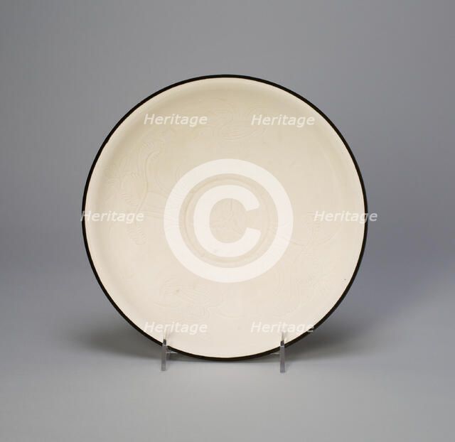 Bowl with Mandarin Ducks in a Lotus Pond, Northern Song dynasty, (960-1127), 11th century. Creator: Unknown.