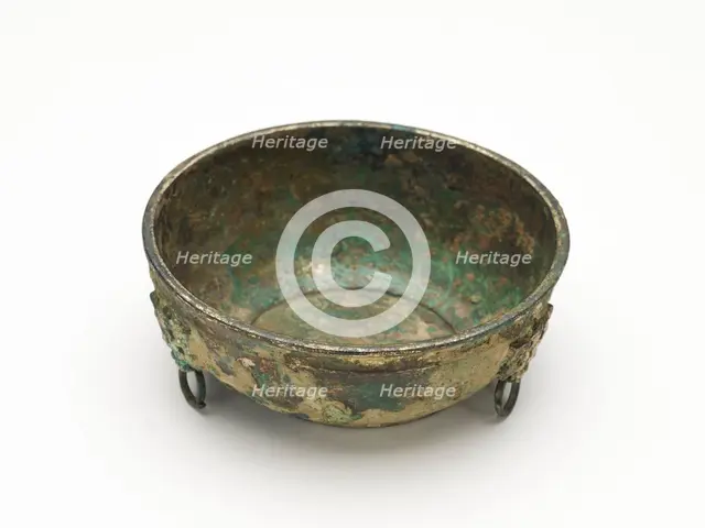 Bowl with masks and ring handles, Han dynasty, 206 BCE-220 CE. Creator: Unknown.