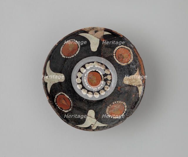 Bowl with Polychrome Decoration on a Black Slip Ground, Iran, 10th century. Creator: Unknown.