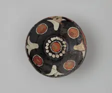 Bowl with Polychrome Decoration on a Black Slip Ground, Iran, 10th century. Creator: Unknown
