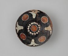 Bowl with Polychrome Decoration on a Black Slip Ground, Iran, 10th century. Creator: Unknown