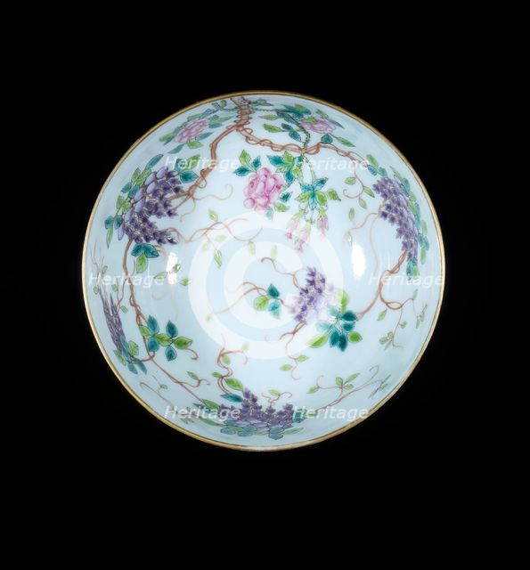 Bowl with ribboned swastikas above waves, Guangxu period, Qing dynasty, China, c1900. Creator: Unknown.