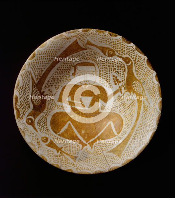Bowl depicting a Man holding a Cup and a Flowering Branch, Iraq, 10th century. Creator: Unknown.