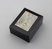 Box with plaque depicting a duck swimming past reeds, probably before 1908. Artist: Ikkoku Kajima