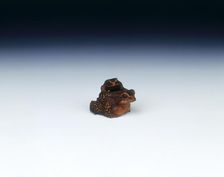 Boxwood netsuke of toad with young, signed by Masanao, Japan, early 19th century. Artist: Masanao