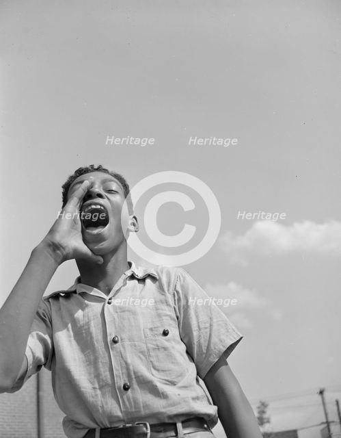 Boy at the playground, Frederick Douglass housing project, Anacostia, D.C.  , 1942. Creator: Gordon Parks.
