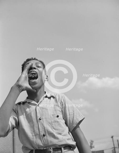 Boy at the playground, Frederick Douglass housing project, Anacostia, D.C.  , 1942. Creator: Gordon Parks.