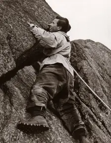 Boy climbing rock face, Outward Bound School, Eskdale, Cumbria,1950