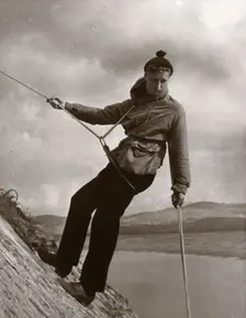Boy descending rock face, Outward Bound School, Eskdale, Cumbria,1950