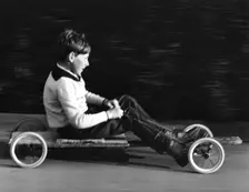Boy driving a home-made go-kart, Horley, Surrey, 1965