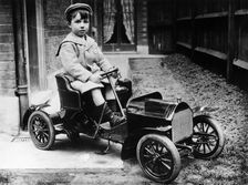 Boy in 1908 Mercedes 28/32 hp pedal car, c1908