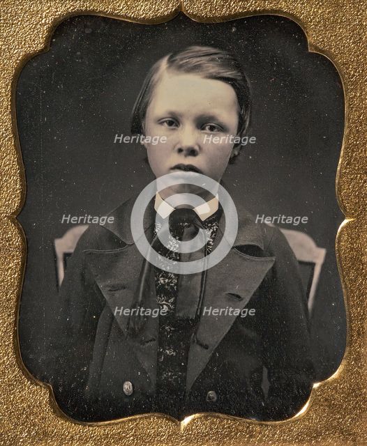 Boy in Wide Lapelled Coat, Seated in Chair, 1850s. Creator: Unknown.