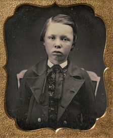 Boy in Wide Lapelled Coat, Seated in Chair, 1850s. Creator: Unknown