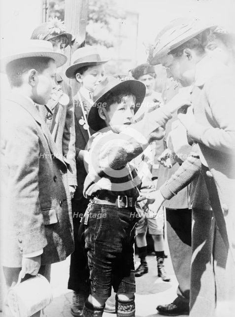 Boy Scout, Paris, Selling "Journee Francaise" Medals, between 1914 and c1915. Creator: Bain News Service.