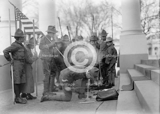 Boy Scouts - Visit of Sir Robert Baden-Powell To D.C. Making Fire, 1911. Creator: Harris & Ewing.