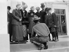 Boy Scouts - Visit of Sir Robert Baden-Powell To D.C. Making Fire; Mrs. Taft Watching, 1911. Creator: Harris & Ewing