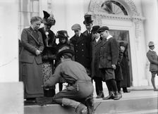 Boy Scouts - Visit of Sir Robert Baden-Powell To D.C. Making Fire; Mrs. Taft Watching, 1911. Creator: Harris & Ewing