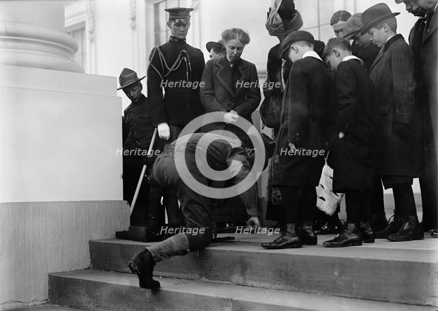 Boy Scouts - Visit of Sir Robert Baden-Powell To D.C. Making Fire; Mrs. Taft Watching, 1911. Creator: Harris & Ewing.